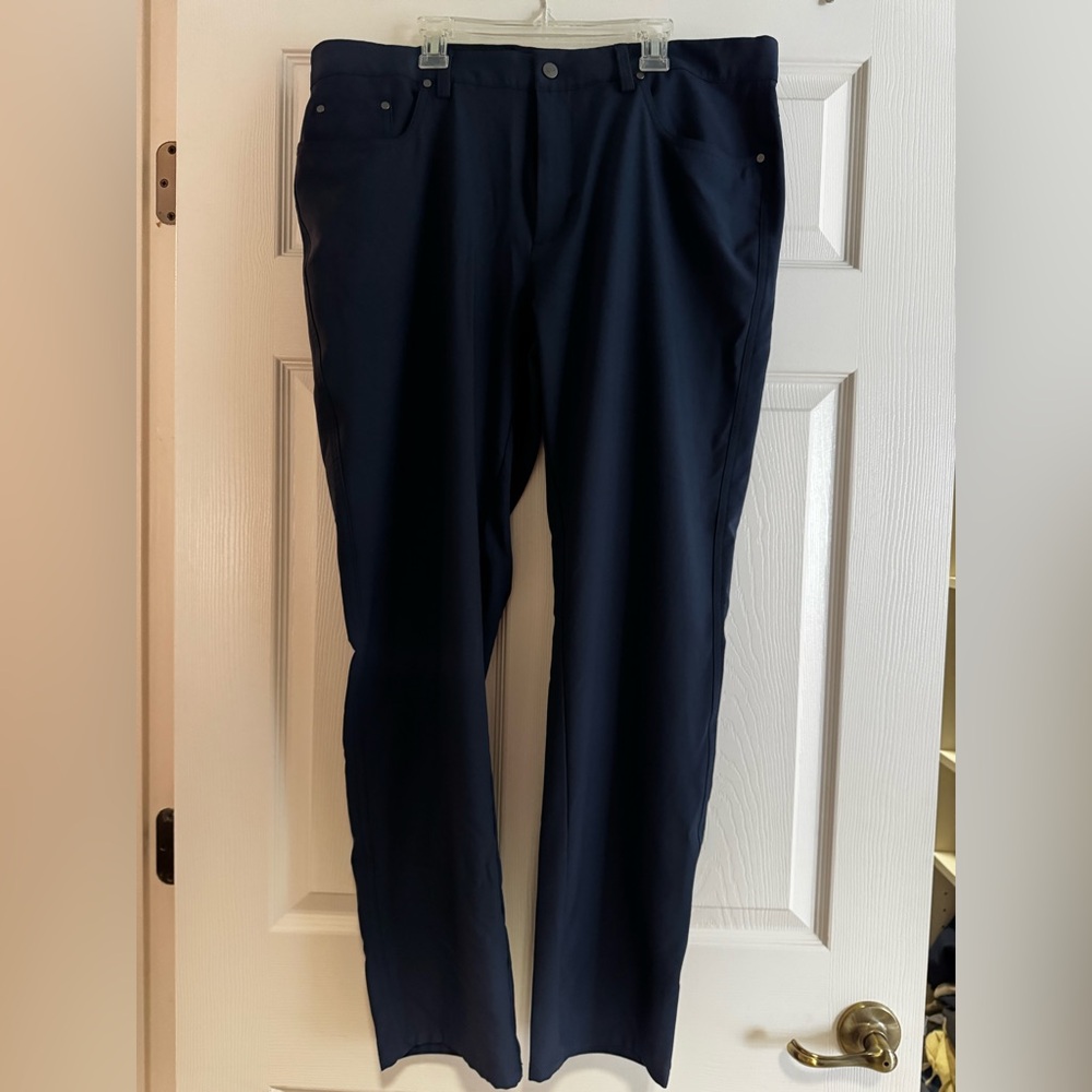 Men's Greg Norman Navy Blue Golf Pants. Size 36 x 32